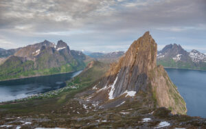 Norway_Segla-7 Spike like rock rising up from the atlantic ocean fjord