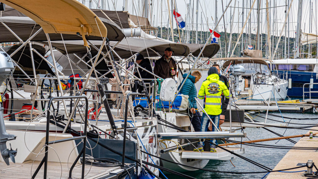 Sailors in the marina preparing for the cruise
