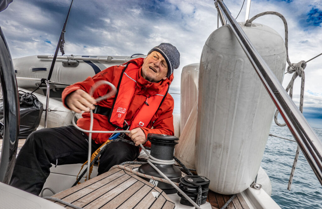 Man trimming sails on Lipari 2026 expedition