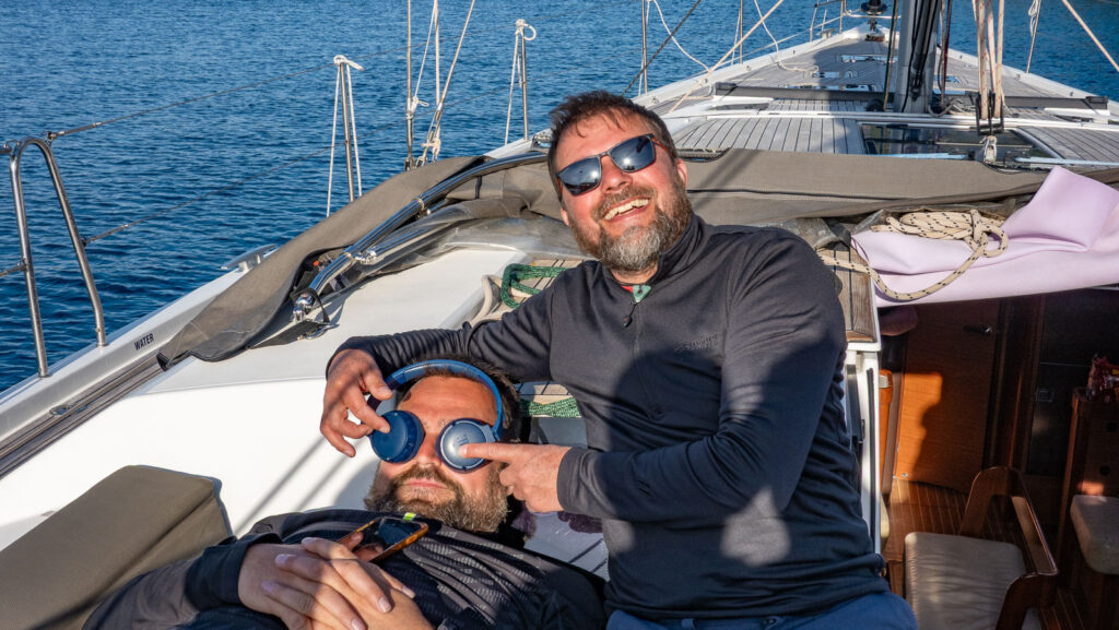 Two guys enjoying sailing