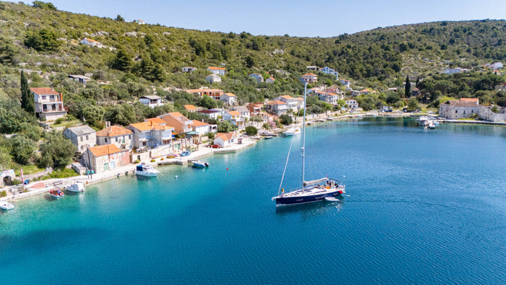 Sailboat in the bay of Drevenik in Croatia manuvering