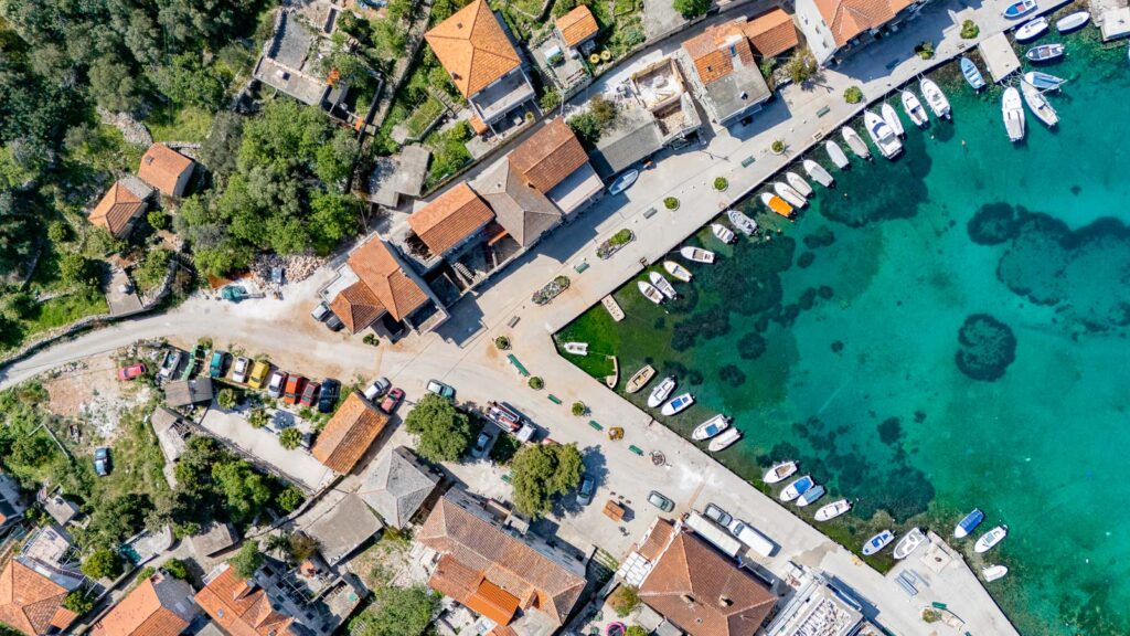 Small marina in croatian village taken from above