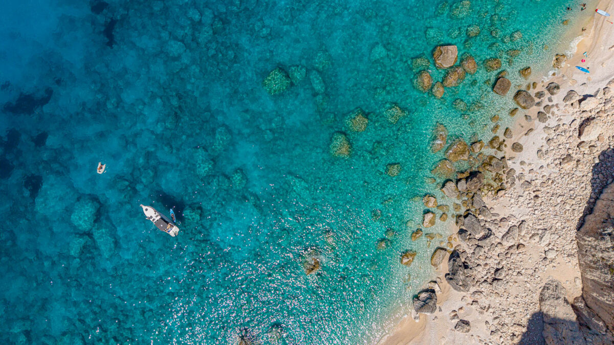 Boat anchored in picturesque bay of Lefkada island